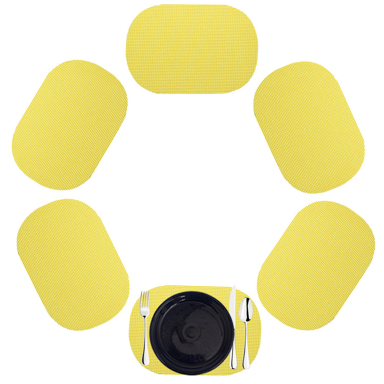 Lemon | Oval fishnet placemat set of 6 in a sunny yellow color.