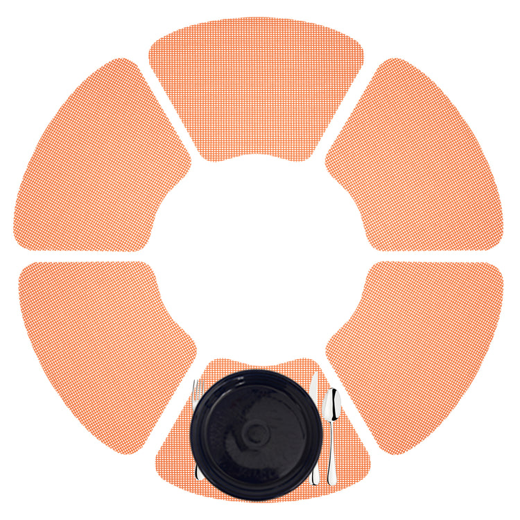 Spice Orange | Fishnet wedge placemats laid out in a circle.