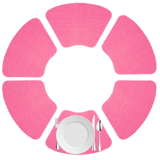Pink Yarrow | Fishnet wedge placemats displayed with a white dinner plate and silver utensil set.