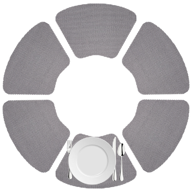 Blackened Pearl | Fishnet wedge placemats displayed in a circle.