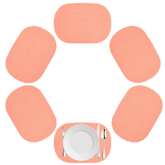 Burnt Coral | Oval fishnet placemat set of 6 in a sunset hue on a white background.