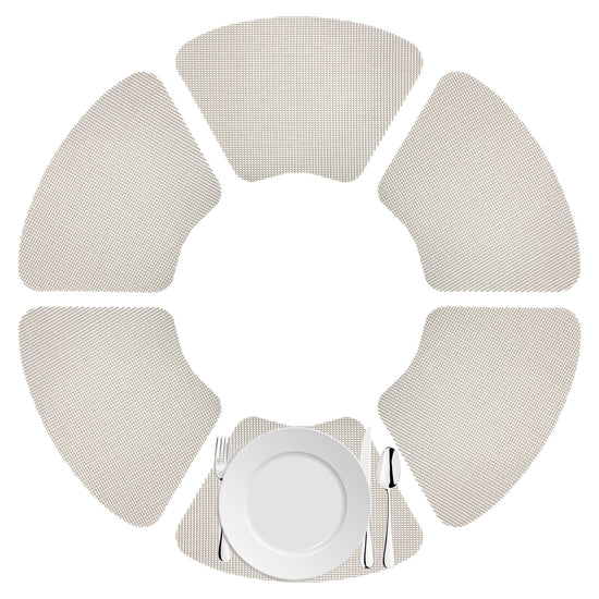 Light Gray | Set of fishnet wedge placemats displayed with silver cutlery.