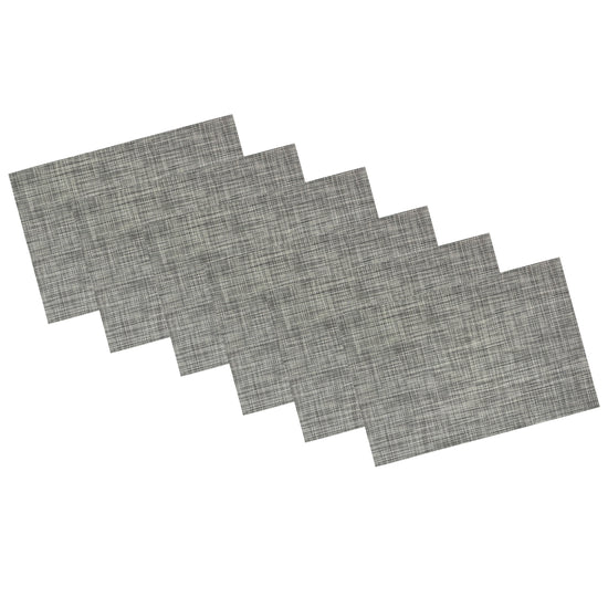 Charcoal | Set of 6 woven placemats in charcoal color stacked neatly on a white background.