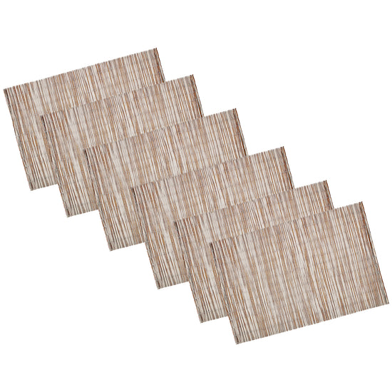 Multi | Set of 6 woven placemats in natural white curry tone, neatly stacked on a white background.