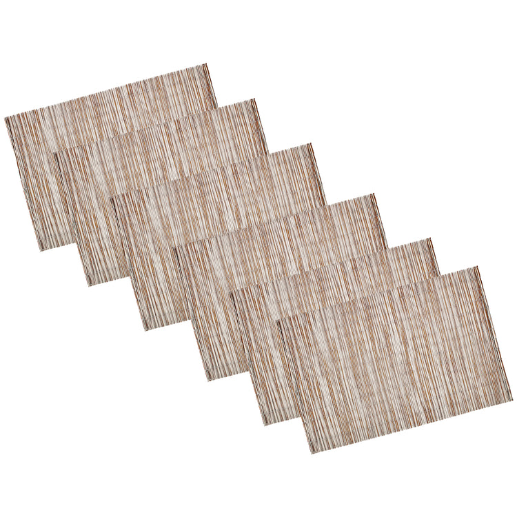 Multi | Set of 6 woven placemats in natural white curry tone, neatly stacked on a white background.