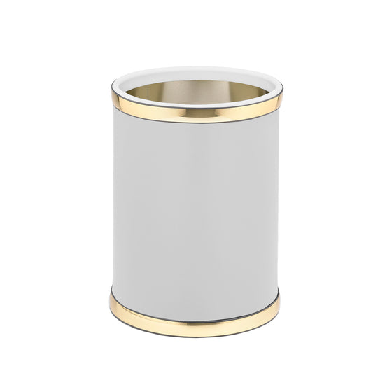 White and Polished Gold | Round leatherette wastebasket with bold gold faux metal top and bottom bands.