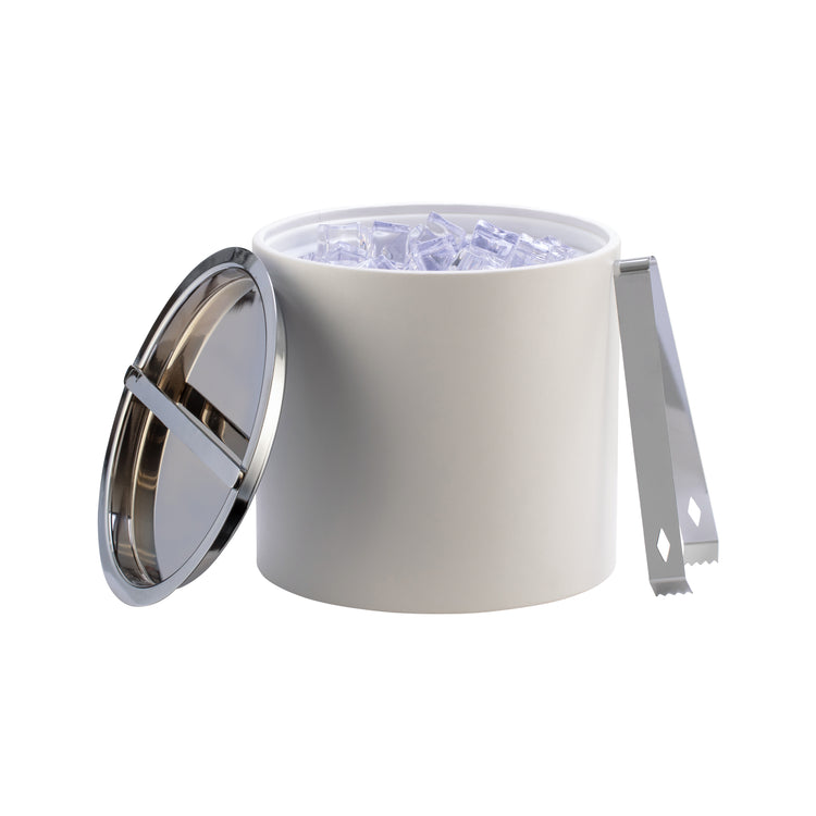 Polished Stainless Steel | Ice tongs placed on the side of an ice bucket.