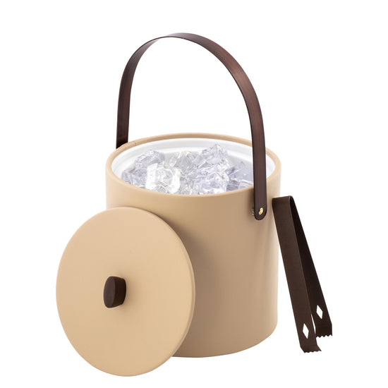 Beige | Elegant ice bucket wrapped in leatherette with matching cover and bronze hardware, shown with tongs on white surface.