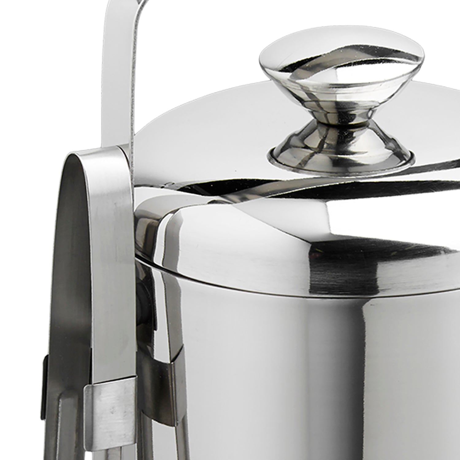 Polished Stainless Steel | Detail view of a stainless-steel ice bucket with a side-mounted tong holder, placed on a white background.