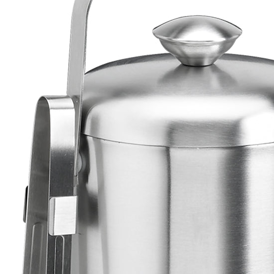 Brushed Stainless Steel | Detail view of the ice bucket featuring a built-in ice tong holder and matching stainless-steel tongs.