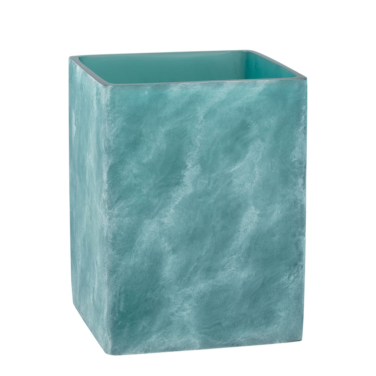 Turquoise | Square wastebasket with ocean wave design on a white background.