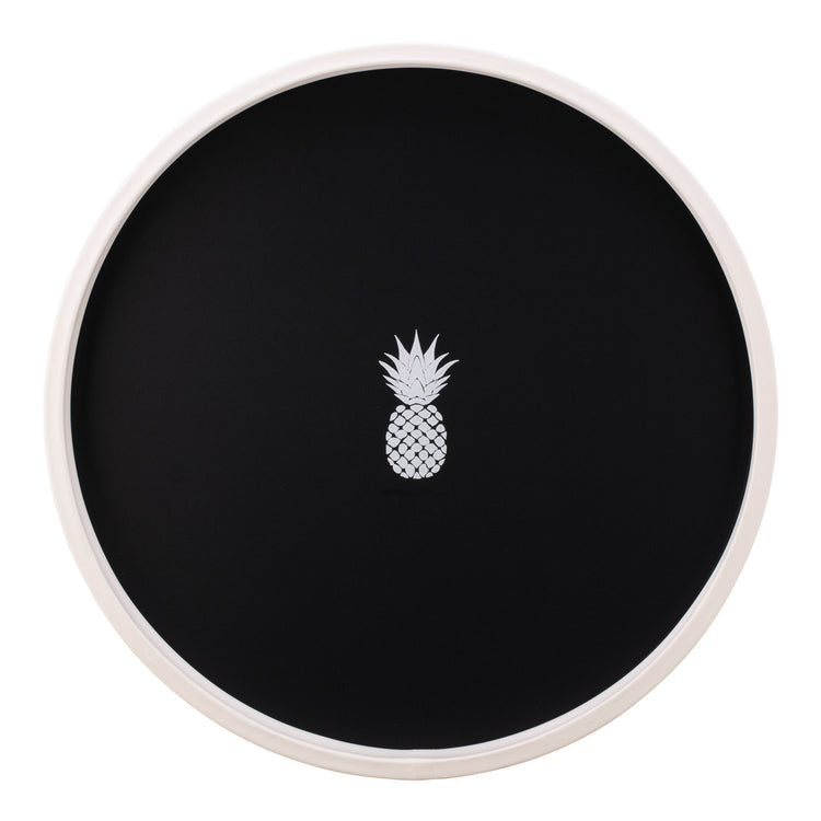 Black | Round serving tray with a centered pineapple graphic, placed on a white surface.