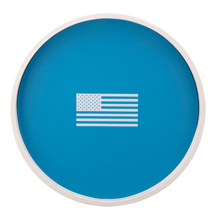 Process Blue | Round serving tray with a white American flag decal centered, displayed on a plain white background.