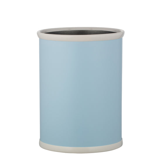 Light Blue | Sleek leatherette wastebasket with oval silhouette, placed on a white surface.