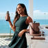 Oil Rubbed Bronze | Woman holding a cocktail shaker with ocean view in the background